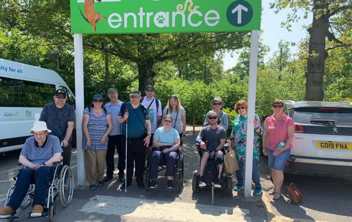 A group photo at the entrance of a zoo during a short break in Hampshire in April 2025.