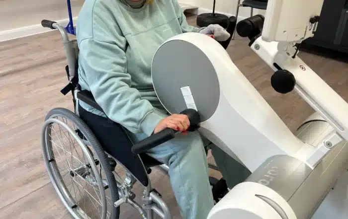 Paul's Place member, Rebecca Foreman, in the gym and physio room at Paul's Place Hub